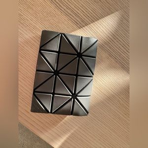 Issey Miyake gray bifold card holder